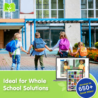 Children holding hands in front of a school building with educational content displayed on screens.