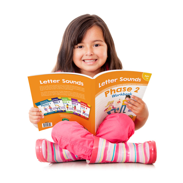 Girl using Junior Learning BB119 Phase 2 Letter Sounds Workbook