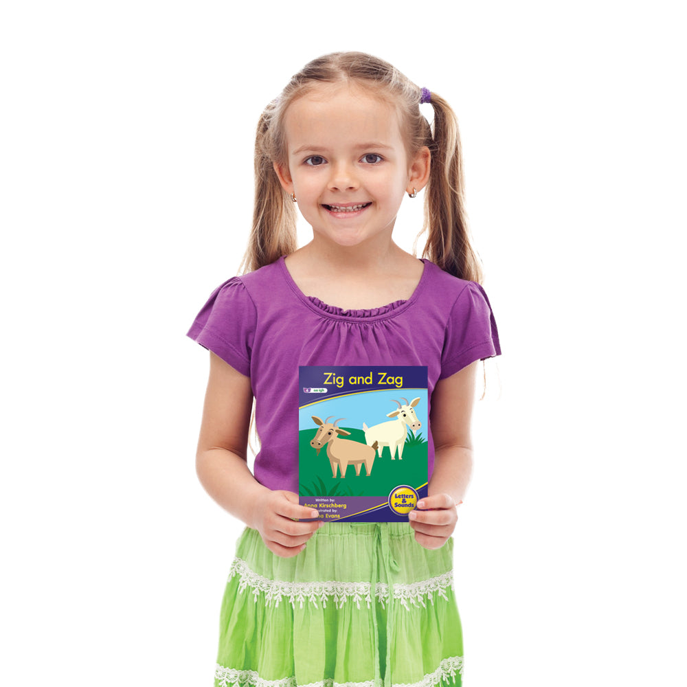 girl holding Junior Learning JL959 Letters and Sounds Phase 3 Set 1 Fiction - 6 Pack