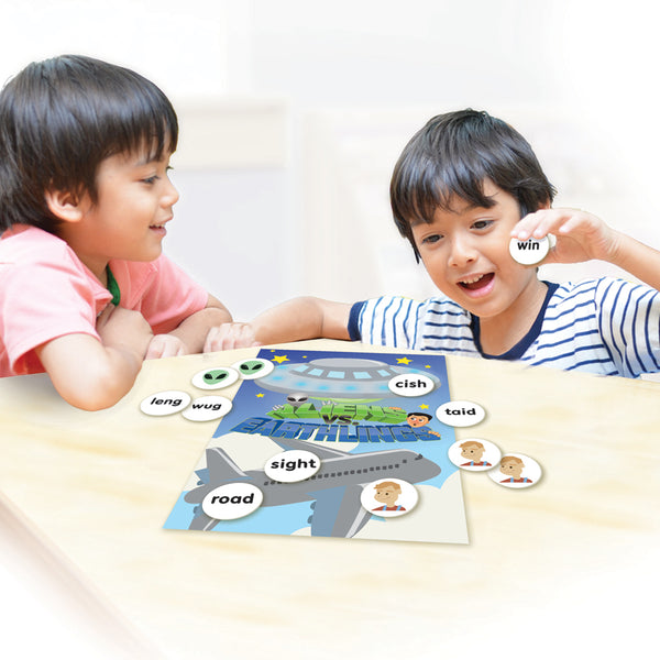 two boys playing Junior Learning JL401 Aliens VS Earthlings decoding words