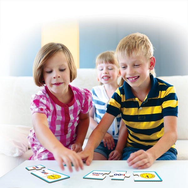 kids playing with Junior Learning JL657 Time Puzzles